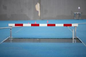 obstáculo y agua en atletismo foto