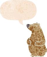 cartoon bear and speech bubble in retro textured style vector