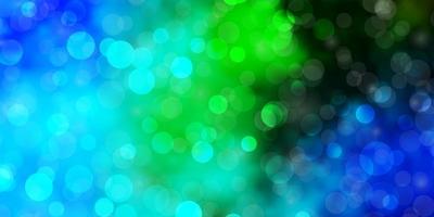 Light Blue, Green vector background with circles.