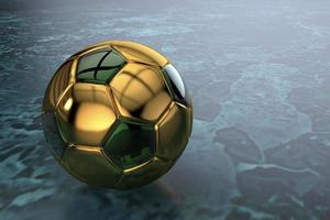3D soccer ball made of gold with green glass inserts photo