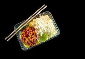 Spaghetti with sauce Take home food in plastic packaging photo