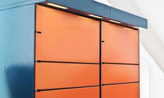 automated self service post terminal machine or locker to receive a parcel or to deposit the box. contactless delivery pick up point photo