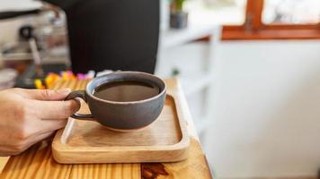 Cup of coffee in coffee shop photo