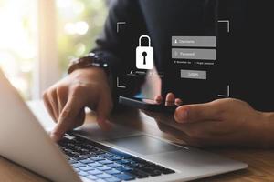 Cybersecurity internet and networking concept. Close up of hand holding smartphone information security and encryption, secure access to user's personal information, secure Internet access. photo