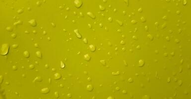 Abstract water drops on the colorful wall. Suitable for promotion and advertising, website, tech industry and company, etc. photo