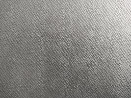 Abstract gray leather upholstery rough textured backgrounds for graphic design add text blanket curtain partition theater scene photo