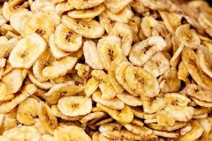 Dehydrated banana slices on a traditional craftsman market.Horizontal image. photo