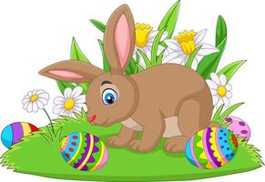 Cartoon bunny with Easter egg on the grass vector