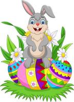 Cartoon happy bunny with colorful Easter eggs vector