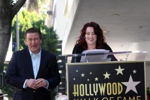 LOS ANGELES  FEB 14 - Alec Baldwin, Megan Mullally at the Walk of Fame Star Ceremony for Alec Baldwin at Beso Resturant on February 14, 2011 in Los Angeles, CA photo