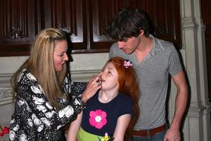 LOS ANGELES, FEB 15 - Dyna Mitte, Lacianne Carriere, RJ Mitte at the Lacianne Carriere birthday party at the El Capitan Theater on February 15, 2013 in Los Angeles, CA photo