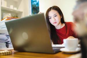 Workaholic people, Woman working overtime at home office. photo