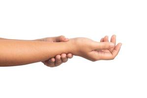 Close up women using hand touching a wrist isolate on white background. photo