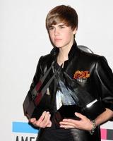 LOS ANGELES  NOV 21 - Justin Bieber in the Press Room of the 2010 American Music Awards at Nokia Theater on November 21, 2010 in Los Angeles, CA photo