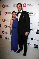 LOS ANGELES, MAR 3 - Josie Loren, Matt Leinart at the Elton John AIDS Foundations Oscar Viewing Party at the West Hollywood Park on March 3, 2014 in West Hollywood, CA photo