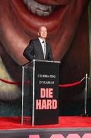 LOS ANGELES, JAN 31 - Bruce Willis at the A Good Day to Die Hard mural unveiling event at the 20th Century Fox Studios on January 31, 2013 in Los Angeles, CA. photo