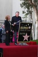 LOS ANGELES, SEP 7 - Maria Elena Holly, Gary Busey at the Buddy Holly Walk of Fame Ceremony at the Hollywood Walk of Fame on September 7, 2011 in Los Angeles, CA photo