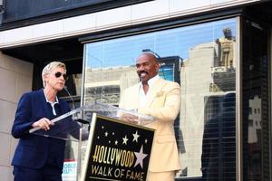 LOS ANGELES, MAY 13 - Ellen DeGeneres, Steve Harvey at the Steve Harvey Hollywood Walk of Fame Star Ceremony at the W Hollywood Hotel on May 13, 2013 in Los Angeles, CA photo