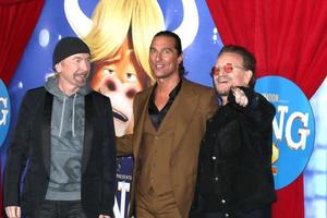 LOS ANGELES  DEC 12 - The Edge, Matthew McConaughey, Bono at the Sing 2 Premiere at the Greek Theater on December 12, 2021 in Los Angeles, CA photo