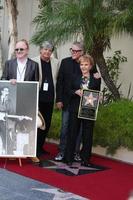 LOS ANGELES, SEP 7 - Peter Asher, Phil Everly, Gary Busey, Maria Elena Holly at the Buddy Holly Walk of Fame Ceremony at the Hollywood Walk of Fame on September 7, 2011 in Los Angeles, CA photo