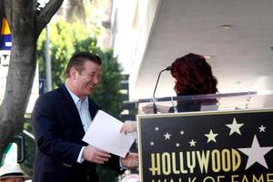 LOS ANGELES  FEB 14 - Alec Baldwin, Megan Mullally at the Walk of Fame Star Ceremony for Alec Baldwin at Beso Resturant on February 14, 2011 in Los Angeles, CA photo