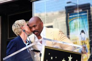 LOS ANGELES, MAY 13 - Ellen DeGeneres, Steve Harvey at the Steve Harvey Hollywood Walk of Fame Star Ceremony at the W Hollywood Hotel on May 13, 2013 in Los Angeles, CA photo