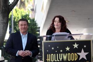 LOS ANGELES  FEB 14 - Alec Baldwin, Megan Mullally at the Walk of Fame Star Ceremony for Alec Baldwin at Beso Resturant on February 14, 2011 in Los Angeles, CA photo