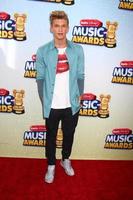LOS ANGELES, APR 27 - Cody Simpson arrives at the Radio Disney Music Awards 2013 at the Nokia Theater on April 27, 2013 in Los Angeles, CA photo