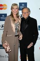 LOS ANGELES, FEB 11 - Larry King and wife arrives at the Pre-Grammy Party hosted by Clive Davis at the Beverly Hilton Hotel on February 11, 2012 in Beverly Hills, CA photo