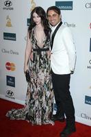 LOS ANGELES, FEB 11 - Michelle Trachtenberg, Thomas Hamilton arrives at the Pre-Grammy Party hosted by Clive Davis at the Beverly Hilton Hotel on February 11, 2012 in Beverly Hills, CA photo