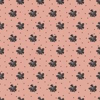 A simple cute pattern of small black flowers on a powder-colored background. Floral seamless background. An elegant template for fashionable prints. vector
