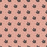 A simple cute pattern of small black flowers on a powder-colored background. Floral seamless background. An elegant template for fashionable prints. vector