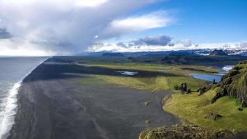 Timelapse of the black sand beach from the cliff of Dyrholaeyjarviti, Iceland. Beautiful Iceland nature. Atlantic ocean coast. video