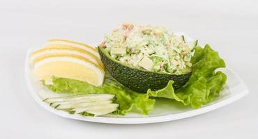 Crab meat salad with green caviar photo