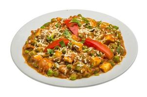 Mutter Paneer on white photo