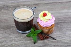 Cupcake with coffee photo