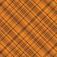 Tartan plaid pattern with texture and warm color. vector