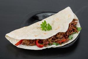 Burrito with minced meat and beans photo