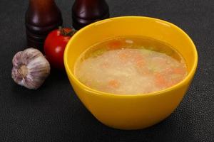 Chicken soup with noodles photo