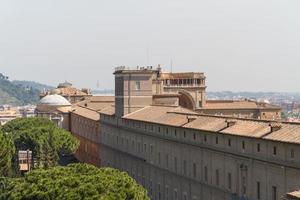 Buildings in Vatican, the Holy See within Rome, Italy. Part of Saint Peter's Basilica. photo