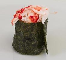 sushi kani with sauced slices of crab shrimp isolated on white background photo
