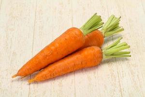Three Young fresh ripe carrot photo