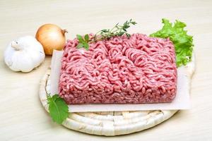 Minced meat on a board photo