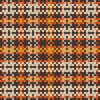 Tartan plaid pattern with texture and warm color. vector