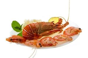 Spiny lobster, shrimps and rice photo