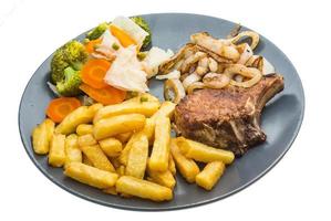 T-bone steak on white background photo