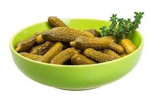 Marinated cucumbers, pickles in a bowl photo