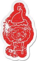 cartoon distressed sticker of a lion wearing santa hat vector