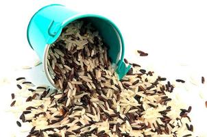 Rice bucket on white background photo