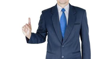 Businessman is pointing his index finger upwards over white background. Photo is focused at hand. Photo includes clipping path.